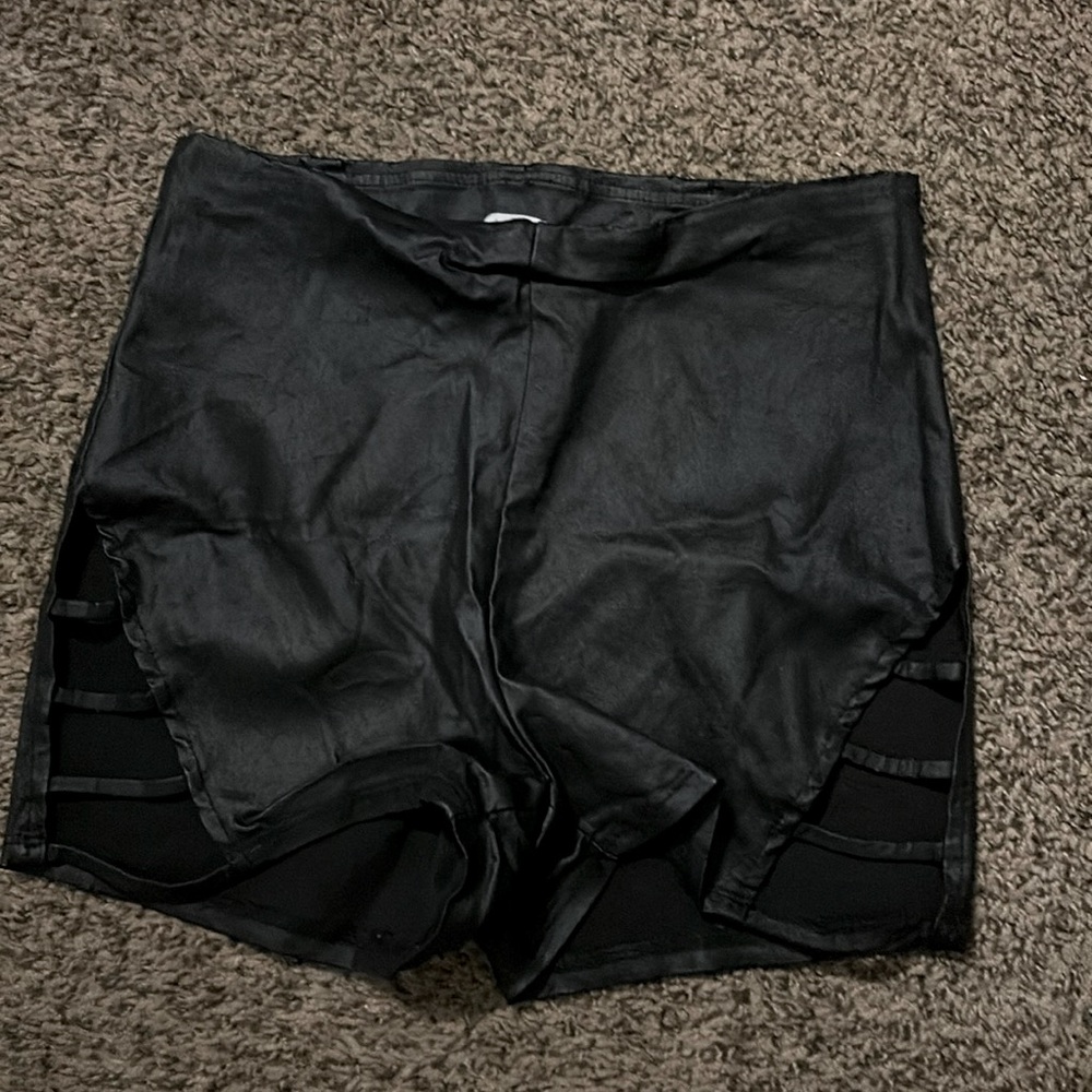 Leather shorts accent slits on thighs